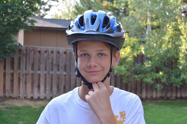 teen wearing a helmet