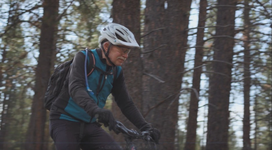 Phil riding his bike on Phil's Trail